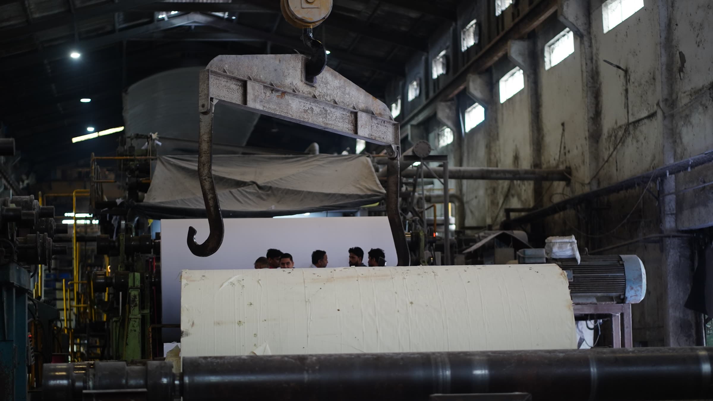 The paper machine hall at Katyayini Mills, sheet running out towards the reel
